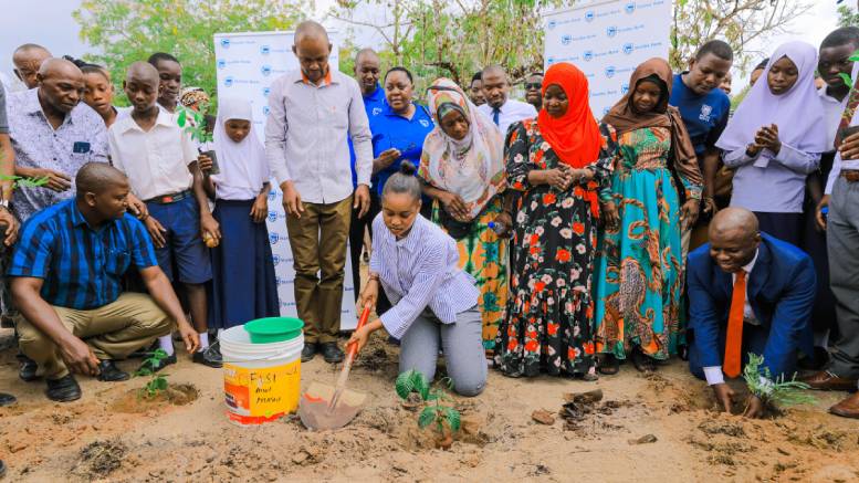 Stanbic Bank Tanzania plant tree Tuangoma Primary School Omari Mtiga